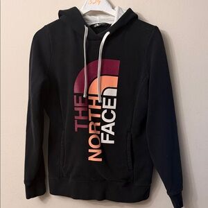 The North Face Black Hoodie with Multicolor Logo kangaroo pockets